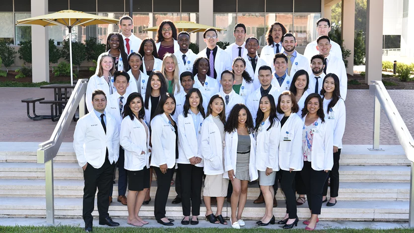 Group of pre-med students in white coats